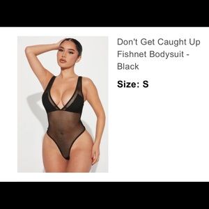 Brand new body suit with tags never worn .